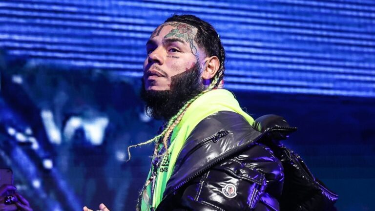 6ix9ine Faces Off With IRS: Luxury Cars Seized in Legal Battle