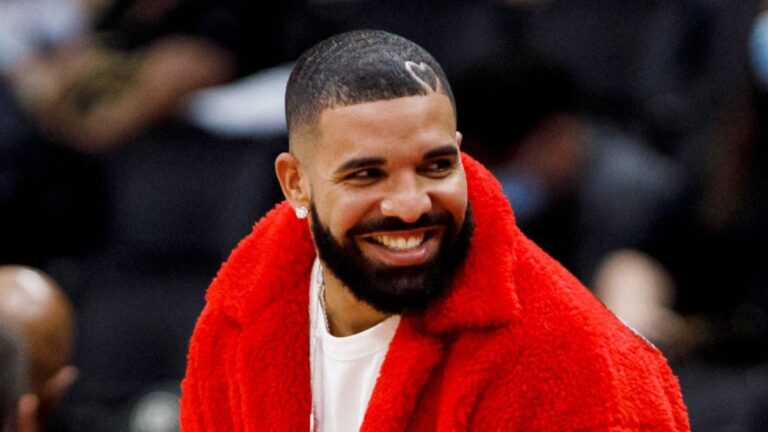 Drake’s Bold Move: Flirts with Ex-NFL Star’s Wife at Concert!