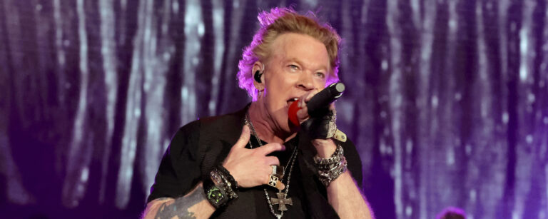 Legendary Rock Star Axl Rose Takes a Tumble on Stage But Bounces Back in Spectacular Fashion!